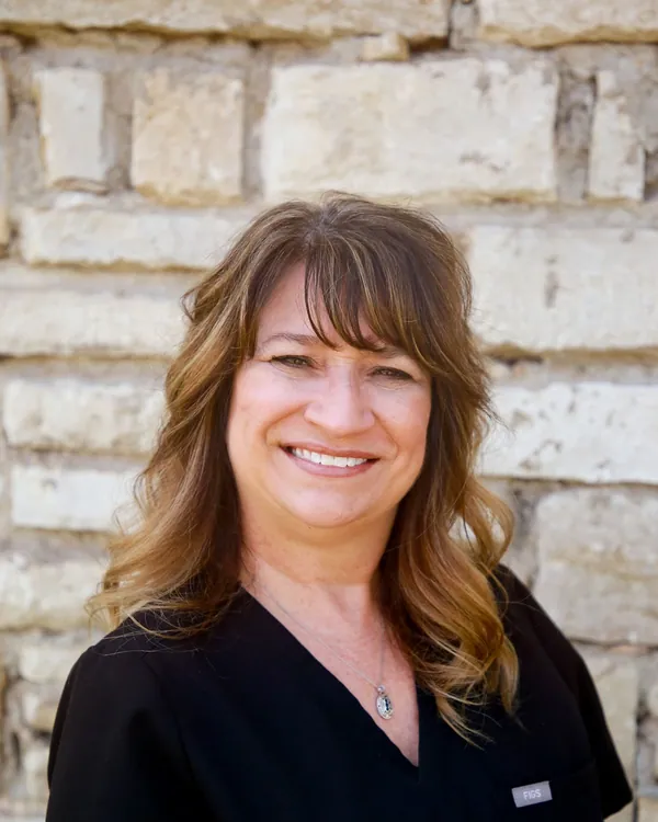 Shawn, asistente dental registrada